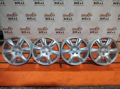 Диск литой б/у SUBARU R15